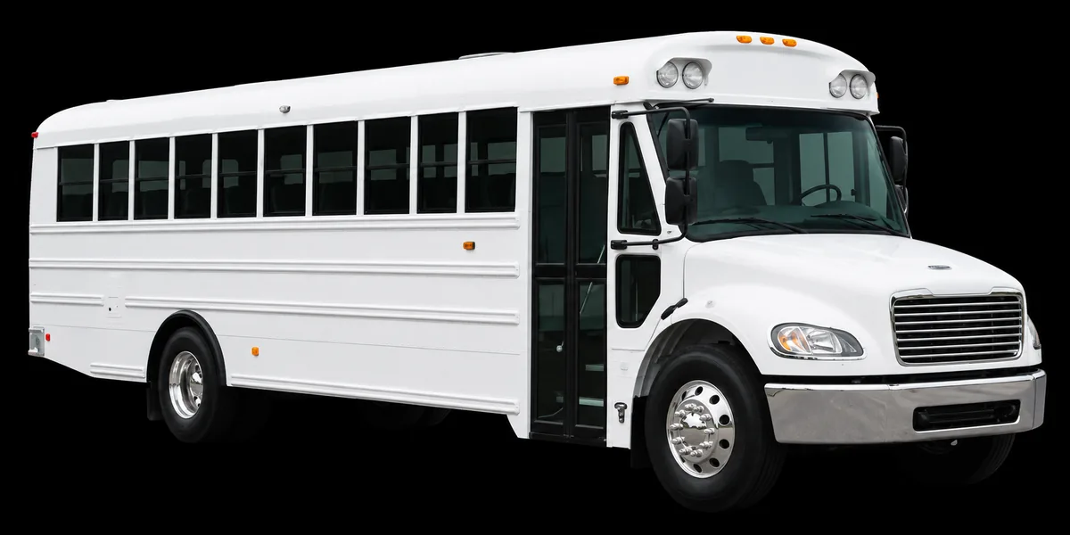 White school bus for student athletics and field trips